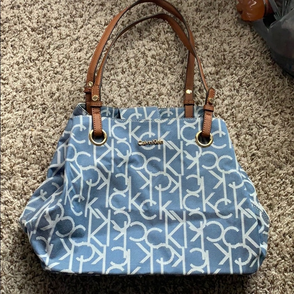 a stylish blue jean like Calvin Klein purse